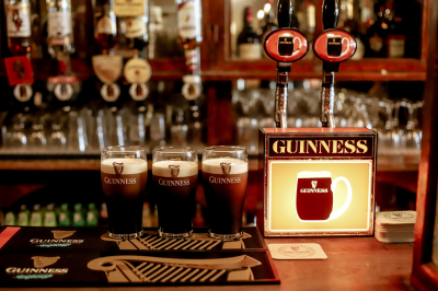 tppt  three pints of guinness on a bar